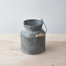 DISTRESSED METAL CHURN