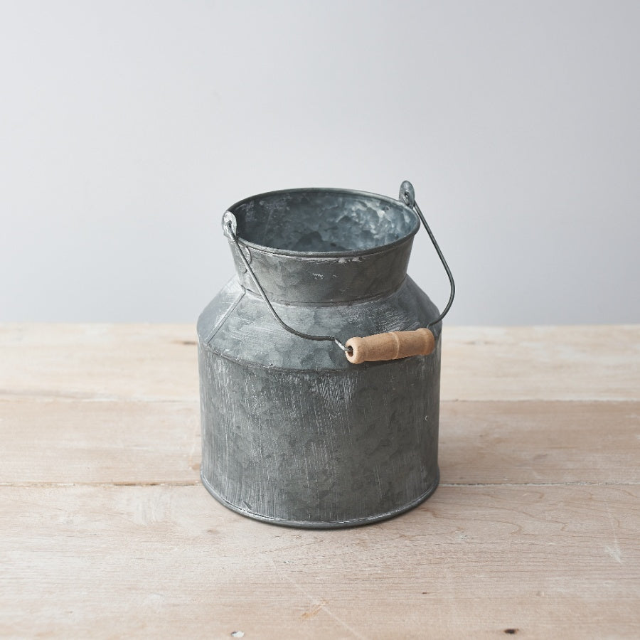 DISTRESSED METAL CHURN