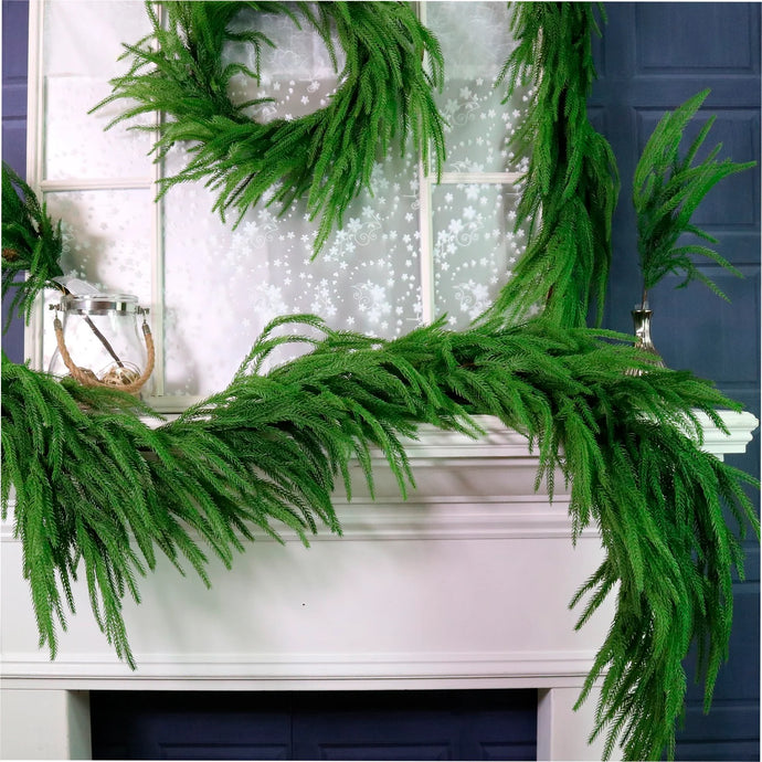 Extra full faux Norfolk pine garland for Christmas mantel styling