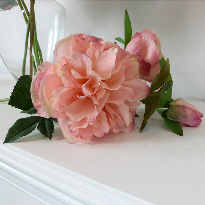 Blush pink peony faux floral stem with two open blooms and green leaves on a single long stem