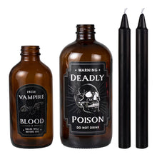 POISON BOTTLES WITH BLACK TAPER CANDLES