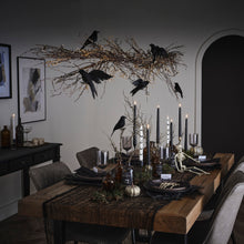 POISON BOTTLES WITH BLACK TAPER CANDLES
